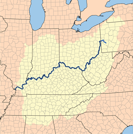 The Ohio River between wooded hills